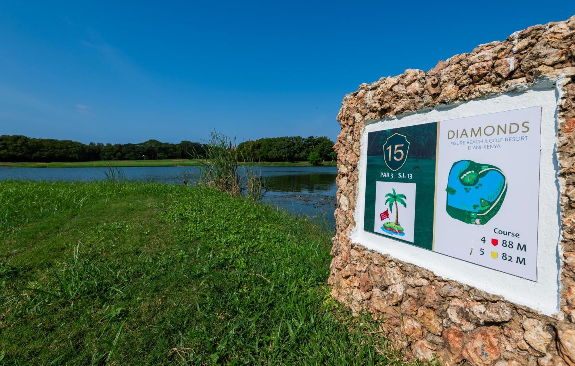 Diamonds Leisure Beach & Golf Resort Diani Beach Esterno foto Golf course sign