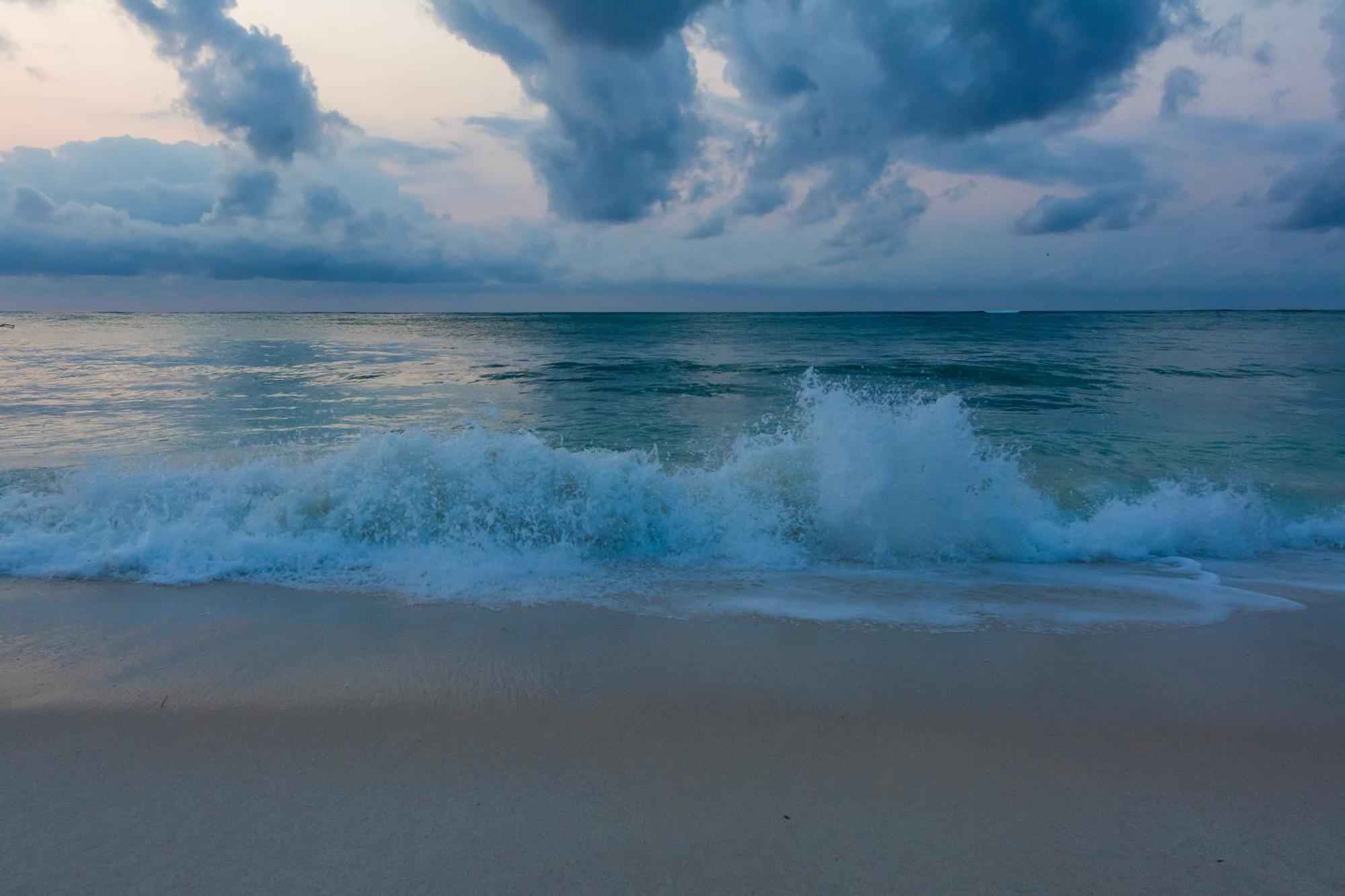 Diamonds Leisure Beach & Golf Resort Diani Beach Esterno foto Sunset at the beach