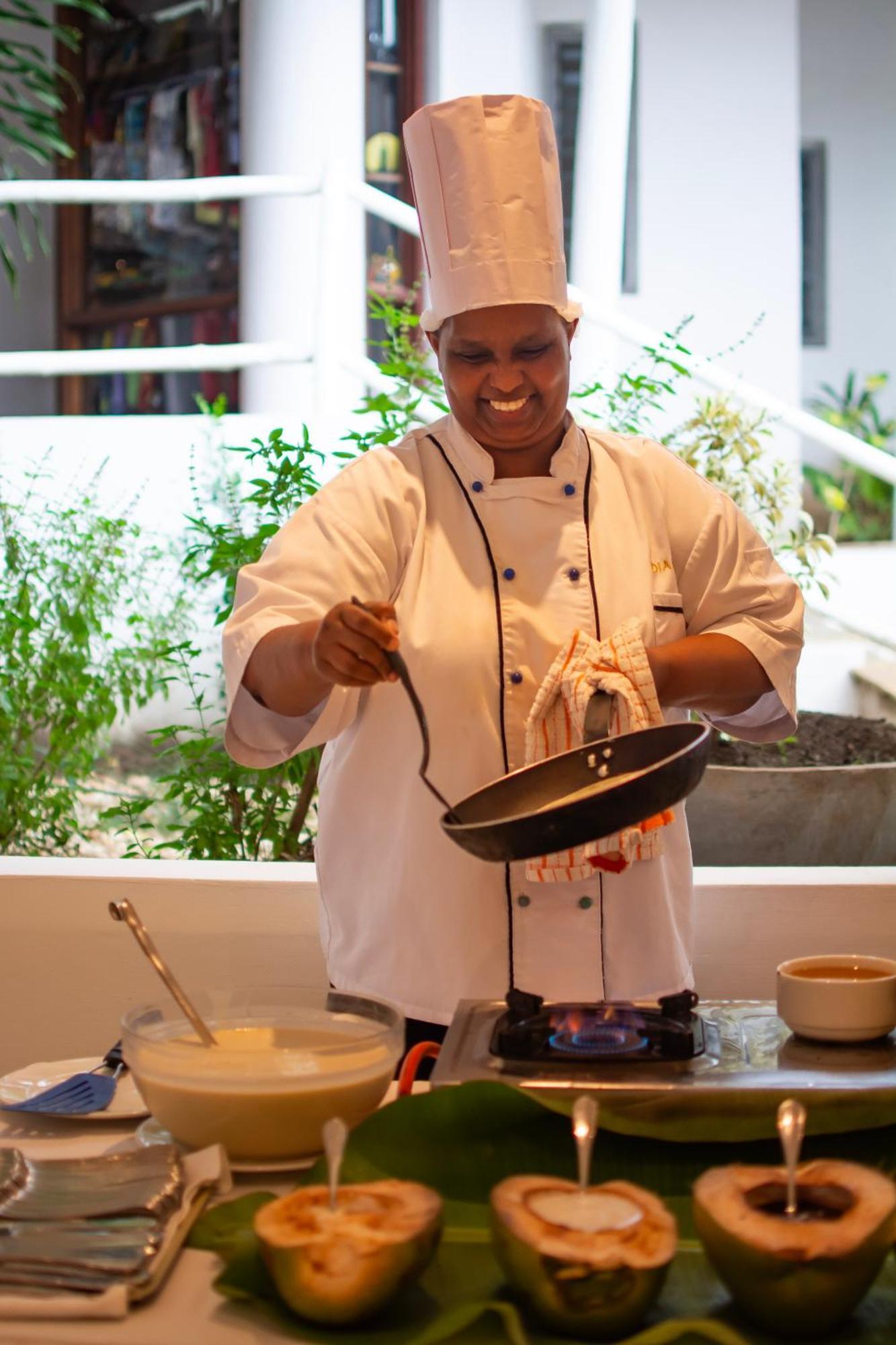 Diamonds Leisure Beach & Golf Resort Diani Beach Esterno foto A chef cooking