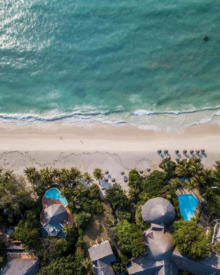 Diamonds Leisure Beach & Golf Resort Diani Beach Esterno foto Aerial view of the beach
